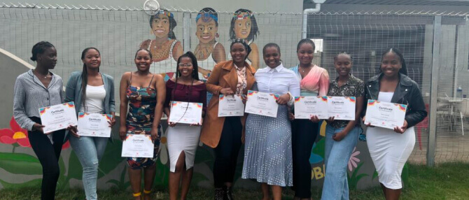 Group of techers with certificates